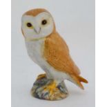 A Beswick figure of a barn owl. Model number 1046. 4  1/2'' high. CONDITION: Please Note -  we do