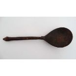 A Norwegian? small red lacquered spoon, with painted decoration to interior of bowl,  7 5/8"  " long