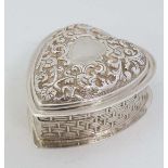 A heart shaped silver box with hinged lid and gilded interior. Hallmarked London 1976 maker A