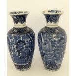 A Pair of blue and  white Japanese style Imari porcelain vases. Decorated with images of storks