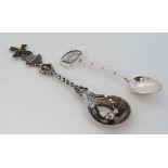 A Chinese Export silver souvenir teaspoon the handle formed  as stylised bamboo surmounted by a flag