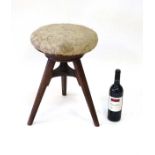 A late 19thC Rosewood tripod adjustable height overstuffed stool, standing on 3 tapering hexagonal