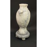 A Chinese / Burmese Jadeite baluster shaped vase with circular stand, the vase having carved