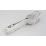 Silver plate asparagus servers with engraved decoration 8" long  CONDITION: Please Note -  we do not