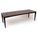 Vintage Retro : A Danish Rosewood ? Long Coffee table standing on four turned tapering legs , with