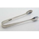 Silver sugar tongs. Hallmarked London 1914 maker Josiah Williams & Co. 4" long (26g) CONDITION: