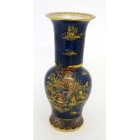 A Carltonware lustre glazed Rouleau vase ,  decorated in the Japan pallette, with images of pagodas.