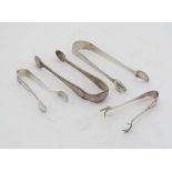 4 assorted pairs of sugar tongs to include:  1 hallmarked London 1803 maker SH, 1 x London 1874