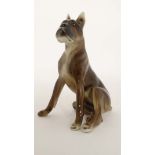 A Royal Belvedere seated boxer dog. Impressed makers mark to base. 5 1/2'' high. CONDITION: Please