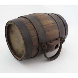 Costrel  : a 19 th C coopered / staved harvest cider barrel with wrought iron hinged handle and