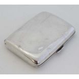 A silver cigarette case with gilded interior. Hallmarked Chester 1900 maker William Neale.  3 1/2" x