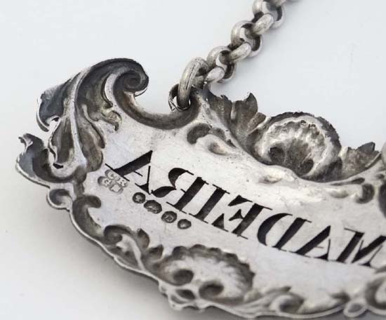 A Victorian silver brandy label with acanthus scroll and shell decoration hallmarked London 1839 - Image 2 of 4