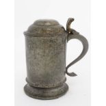 A c.1900 hinged lidded pewter tankard, indistinctly marked under 6 1/2" high  CONDITION: Please Note