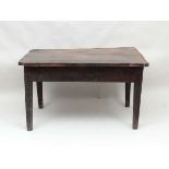 A mid 19thC farmhouse elm topped kitchen table , the table having a thick rounded edge elm top on