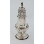 An 18thC silver caster . Hallmarked London 1770 maker Jabez Daniell & James Mince . 4 3/4" high (