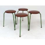 Vintage Industrial : a set of four circular stools , with faux leather upholstered seats , and