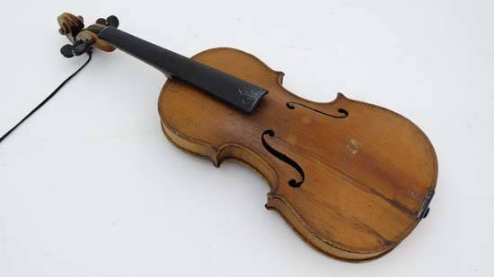 Musical Instruments : A 3/4 size student's violin , bears label within ' Antonius Stadivarius