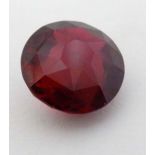 A large unmounted ruby ( approx 3/4" diameter and 8g) CONDITION: Please Note -  we do not make