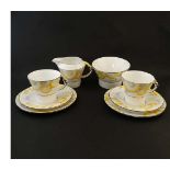 A Royal Albert '' Princess Marina '' pattern Art Deco part tea set . Decorated with yellow flowers