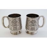 South / Central America white metal : A pair of 0900 silver tankards with geometric stylized Mayan /