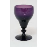 A 19thC amethyst glass  wine glass. Approx 6" tall  CONDITION: Please Note -  we do not make