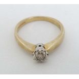 A 9ct gold ring set with central diamond  CONDITION: Please Note -  we do not make reference to