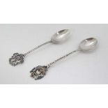 2 silver souvenir teaspoons one with 'Exeter' coat of arms, the other ' Chester '. Hallmarked