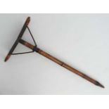 Shooting : A c1900 French shooting stick of bamboo and steel construction, marked Bte SGDG ('Brevete