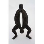 An African cast bronze sculpture having ears, hand and eye relief. 7 1/2" high  CONDITION: Please