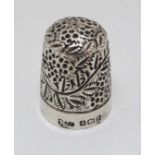 A silver thimble hallmarked Birmingham 1901 maker James Swann. 7/8" high  CONDITION: Please