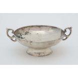 A silver bon bon dish with twin C-scroll handles and circular foot . Hallmarked Sheffield 1915 maker