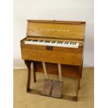 Musical Instruments : A pine travel harmonium organ, manufactured by M. Horugel of Leipzig. The pine