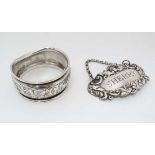 A silver plate wine label 'SHERRY'  together with a silver napkin ring  hallmarked Chester 1906 (