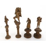 A collection on 4 19thC carved wooden figures depicting Swiss / Tyrolean figures. Largest 5 1/4"