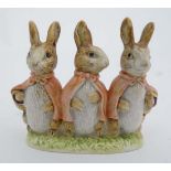 A Beswick Beatrix Potter figure group of '' Flopsy, Mopsy and Cottontail  '' with gold oval back