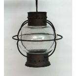 Porch Lantern : a Brass hanging hall porch lantern in the form of a ship's light with clear glass