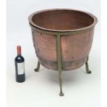 Large Copper log basket : a 19 th century hot water ' copper ' with three painted wrought iron