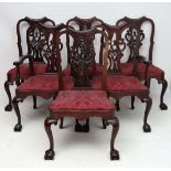 A set of 6 4+2 c.1900 mahogany dining chairs with ball and claw feet and drop in shaped generous