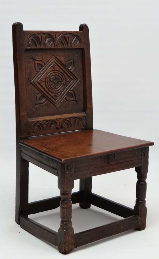 A 17thC carved oak solid seat single chair with panel back . 33" high x 17 3/4" wide x 15" deep - Image 3 of 4