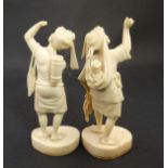 A pair of c.1900 Indo figures ( man and woman with child )  stood upon a shaped base. Each