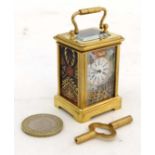 Miniature Carriage Clock : a gilt brass 5 glass( 3 of which are porcelain)  cased Carriage Timepiece