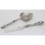 A silver Victorian butter knife hallmarked Sheffield 1859 maker Martin Hall & Co together with a