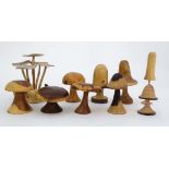 12 assorted toadstool groups made from turned wood. Some signed, to include toadstools made from