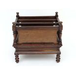 An early - mid 19thC Rosewood Canterbury having 3-divisions to top and  concave moulded frieze