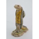 A Beswick Beatrix Potter figure of '' Sir Issac Newton '' with brown line back stamp. 4'' high