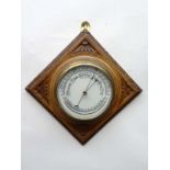 6" oak wall Barometer : a 6 " Aneroid barometer ( adjustable to sea level) with porcelain dial