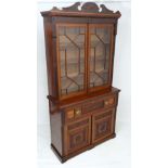 A 19thC walnut glazed top secretaire book case, with astral glazed twin doors before 3 adjustable