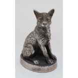 A silver model of a seated fox.  Hallmarked Sheffield 1987 maker HL 3 1/2" high . (weighted)