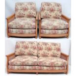 Vintage Retro : a British made Ercol  blonde oak sofa and two armchairs having caned sides and