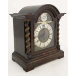 Jungans 3 train Westminster Mantle clock : an oak cased musical clock with barleytwist side columns,